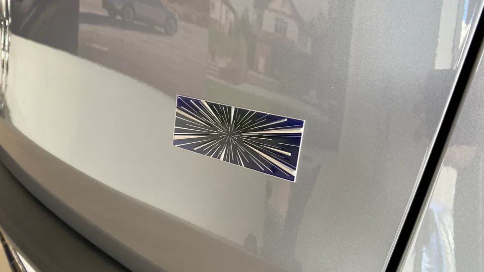 Tesla Model Y Performance "Performance" logo